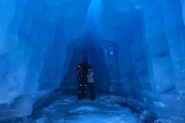 a man that is standing in the snow